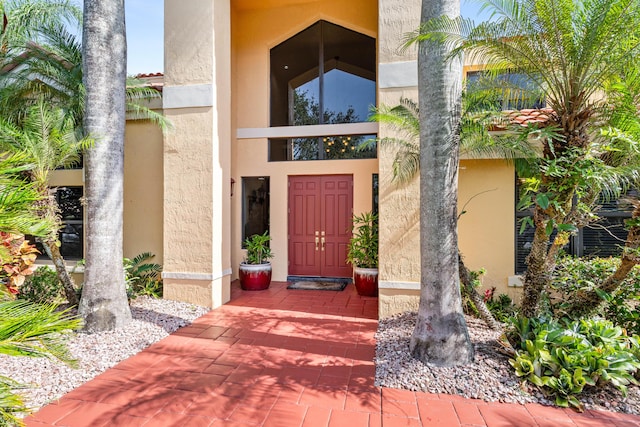3049 NW 61st St, Boca Raton, FL 33496 - doorway to property featuring stucco siding