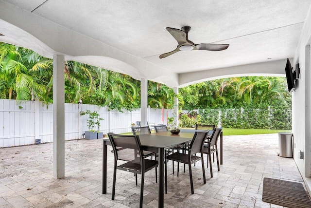1145 SW 20th St, Boca Raton, FL 33486 - fenced backyard featuring outdoor dining space, a patio, and a ceiling fan