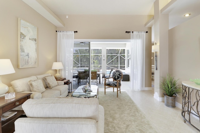 10120 Inverness Way, Port Saint Lucie, FL 34986 - living area featuring light tile patterned flooring, a sunroom, baseboards, and ceiling fan