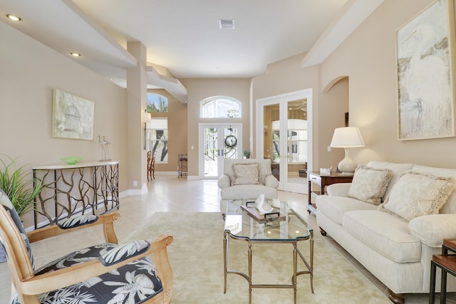 10120 Inverness Way, Port Saint Lucie, FL 34986 - living room featuring recessed lighting, light tile patterned floors, and baseboards