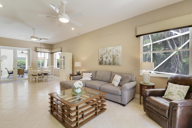 10120 Inverness Way, Port Saint Lucie, FL 34986 - living area featuring light tile patterned floors, a ceiling fan, healthy amount of natural light, and recessed lighting