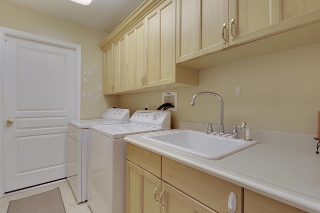 10120 Inverness Way, Port Saint Lucie, FL 34986 - laundry area with cabinet space, washing machine and dryer, and light tile patterned flooring