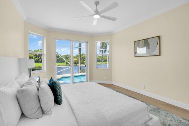 6845 Big Cypress Dr, Jupiter, FL 33458 - bedroom with access to outside, wood finished floors, ornamental molding, and a ceiling fan