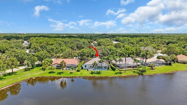6845 Big Cypress Dr, Jupiter, FL 33458 - aerial perspective of suburban area with a forest and a nearby body of water