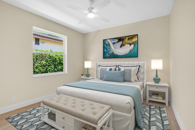 6845 Big Cypress Dr, Jupiter, FL 33458 - bedroom with wood finished floors and a ceiling fan