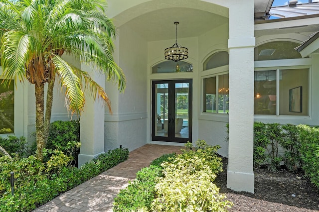 6845 Big Cypress Dr, Jupiter, FL 33458 - property entrance with french doors and stucco siding