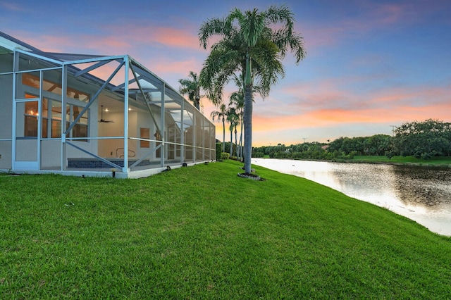 6845 Big Cypress Dr, Jupiter, FL 33458 - view of grassy yard featuring a water view and glass enclosure