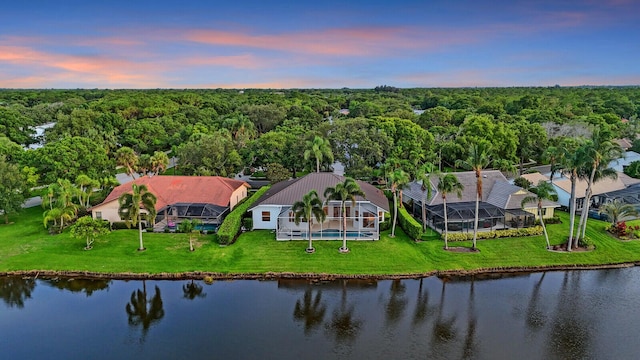 6845 Big Cypress Dr, Jupiter, FL 33458 - aerial view at dusk of a forest view and a water view