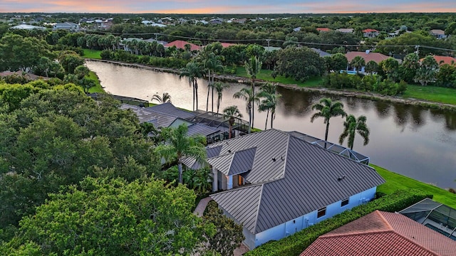 6845 Big Cypress Dr, Jupiter, FL 33458 - aerial view at dusk of a water view and view of scattered trees