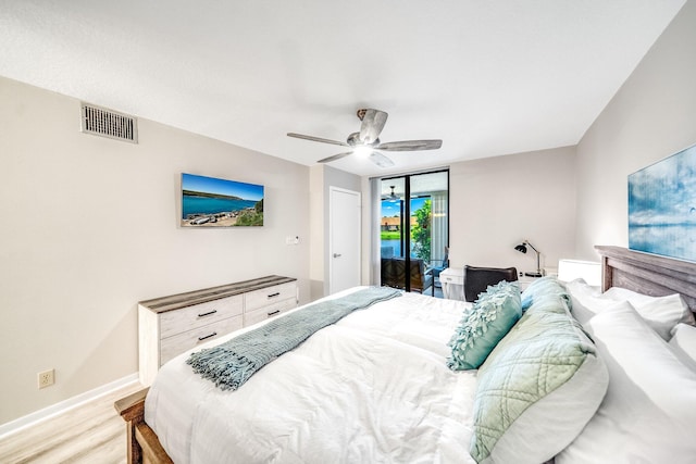 8641 Boca Glades D Blvd W Unit D, Boca Raton, FL 33434 - bedroom with light wood finished floors and a ceiling fan