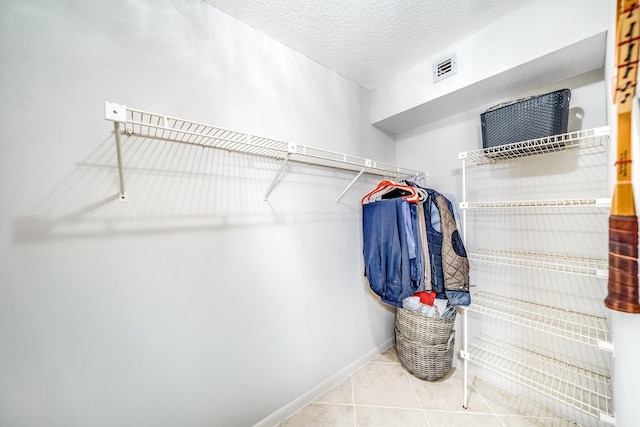8641 Boca Glades D Blvd W Unit D, Boca Raton, FL 33434 - walk in closet featuring tile patterned floors