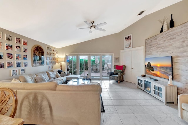 7574 Ironbridge Cir, Delray Beach, FL 33446 - living area featuring vaulted ceiling, a ceiling fan, and light tile patterned flooring