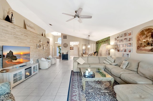 7574 Ironbridge Cir, Delray Beach, FL 33446 - living area with light tile patterned flooring, a ceiling fan, and vaulted ceiling