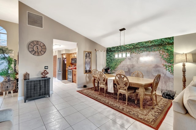 7574 Ironbridge Cir, Delray Beach, FL 33446 - dining space featuring light tile patterned floors and high vaulted ceiling