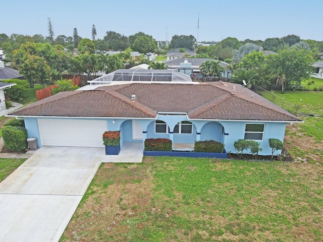 865 SE Tierra Ct, Port Saint Lucie, FL 34983 - view of front of property with an attached garage, driveway, and stucco siding