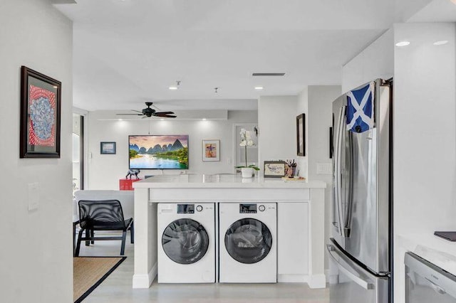 1841 Bridgewood Dr, Boca Raton, FL 33434 - laundry room with ceiling fan, washing machine and clothes dryer, and baseboards