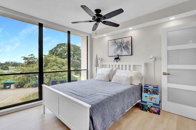 1841 Bridgewood Dr, Boca Raton, FL 33434 - bedroom featuring light wood-style flooring, a ceiling fan, and recessed lighting