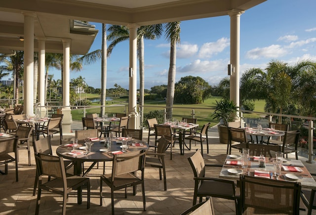1841 Bridgewood Dr, Boca Raton, FL 33434 - view of patio / terrace with outdoor dining space, golf course view, and a water view