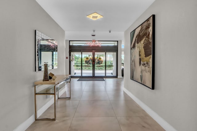 1841 Bridgewood Dr, Boca Raton, FL 33434 - corridor featuring baseboards and tile patterned flooring