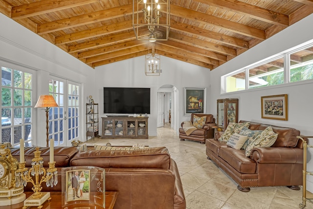 134 Worth Ct N, West Palm Beach, FL 33405 - living area featuring arched walkways, wood ceiling with exposed beams, and high vaulted ceiling
