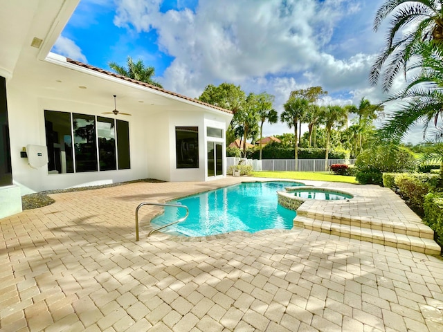 1186 Breakers W Blvd, West Palm Beach, FL 33411 - view of swimming pool with a patio, ceiling fan, and a pool with connected hot tub