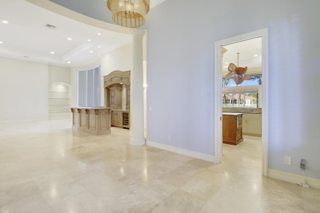 1186 Breakers W Blvd, West Palm Beach, FL 33411 - empty room featuring decorative columns, ornamental molding, recessed lighting, baseboards, and a raised ceiling