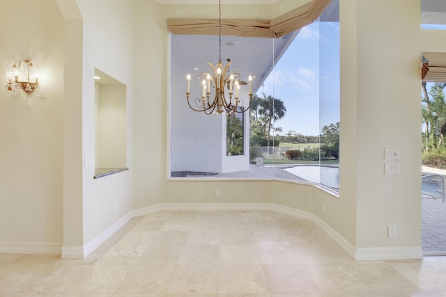 1186 Breakers W Blvd, West Palm Beach, FL 33411 - unfurnished dining area featuring a chandelier, arched walkways, and tile patterned floors