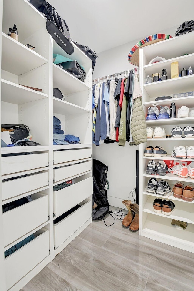 298 Las Palmas St, Royal Palm Beach, FL 33411 - spacious closet with light wood-style flooring