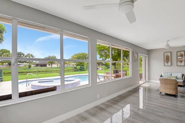 298 Las Palmas St, Royal Palm Beach, FL 33411 - sunroom / solarium featuring baseboards