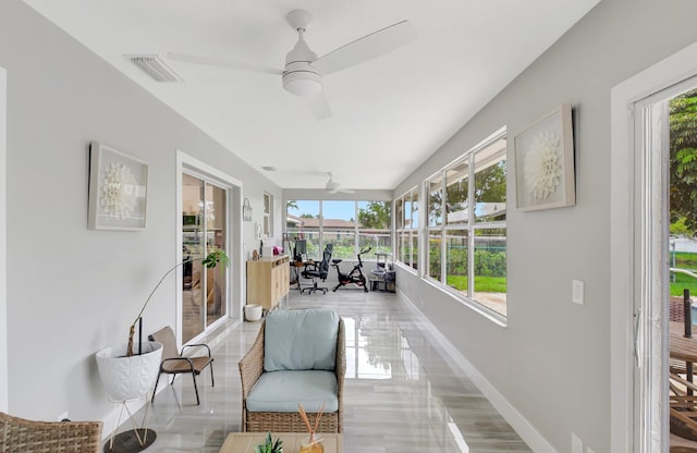298 Las Palmas St, Royal Palm Beach, FL 33411 - sunroom featuring baseboards