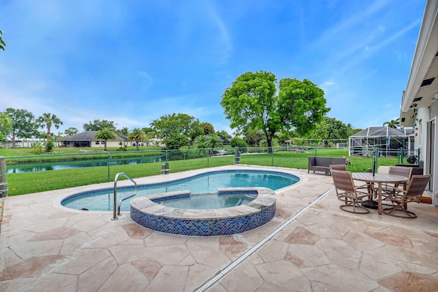 298 Las Palmas St, Royal Palm Beach, FL 33411 - view of pool with a patio area, a pool with connected hot tub, and a water view