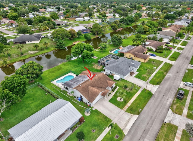 298 Las Palmas St, Royal Palm Beach, FL 33411 - aerial perspective of suburban area with a nearby body of water
