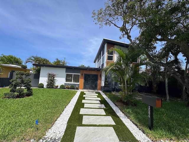 3056 NE 14th Ave, Oakland Park, FL 33334 - modern home with french doors and stucco siding