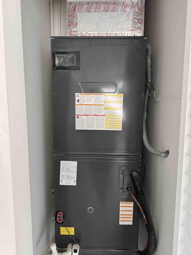 3056 NE 14th Ave, Oakland Park, FL 33334 - utility room with heating unit