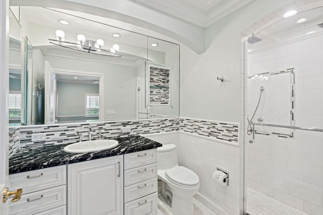 4700 Sanctuary Ln, Boca Raton, FL 33431 - bathroom with ornamental molding, a shower stall, vanity, tile walls, and recessed lighting