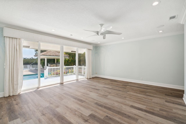 4700 Sanctuary Ln, Boca Raton, FL 33431 - empty room with ceiling fan, ornamental molding, wood finished floors, a textured ceiling, and recessed lighting