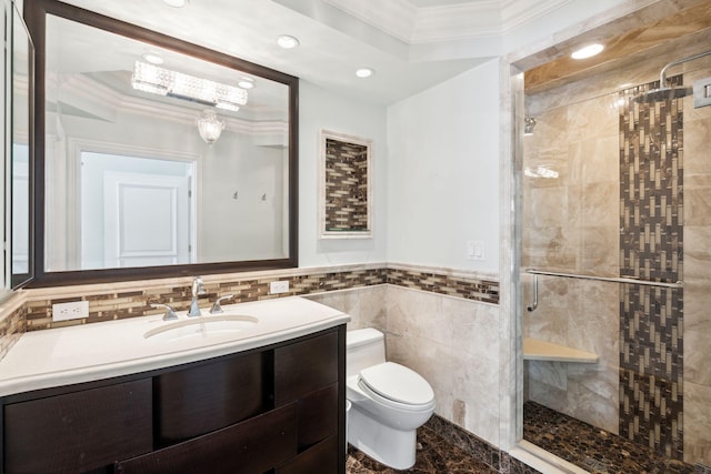 4700 Sanctuary Ln, Boca Raton, FL 33431 - bathroom with ornamental molding, a stall shower, vanity, tile walls, and a wainscoted wall