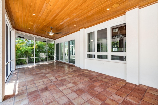 4700 Sanctuary Ln, Boca Raton, FL 33431 - unfurnished sunroom featuring wooden ceiling, ceiling fan, expansive windows, and recessed lighting