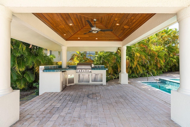 4700 Sanctuary Ln, Boca Raton, FL 33431 - view of patio / terrace featuring an outdoor kitchen, a gazebo, ceiling fan, and an outdoor pool