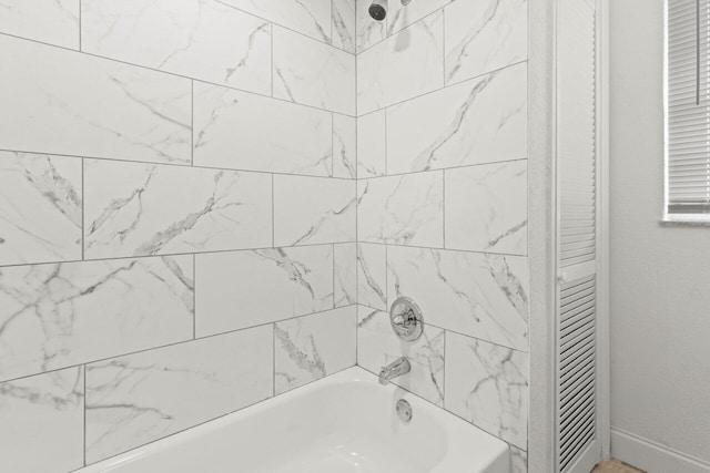 798 SE Atlantus Ave, Port Saint Lucie, FL 34983 - full bathroom featuring bathtub / shower combination