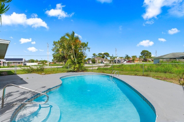 798 SE Atlantus Ave, Port Saint Lucie, FL 34983 - view of pool with a patio