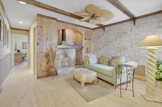 7158 Foxworth Ct, Boynton Beach, FL 33437 - living area with beamed ceiling, a ceiling fan, wood finished floors, a brick fireplace, and wood walls