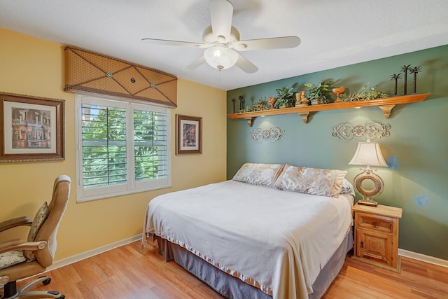 7158 Foxworth Ct, Boynton Beach, FL 33437 - bedroom featuring light wood finished floors, baseboards, and a ceiling fan