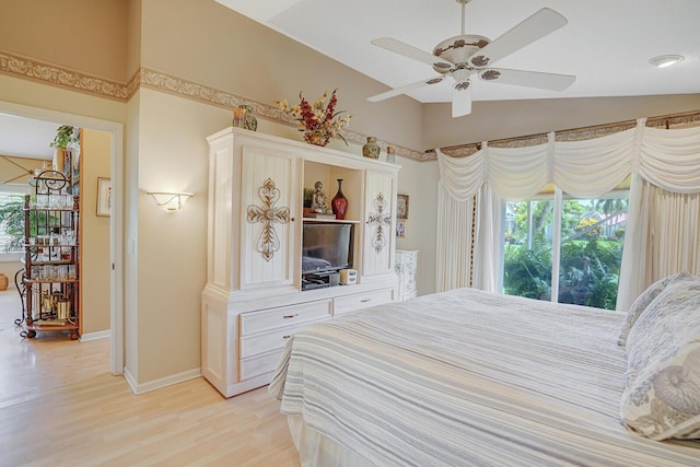 7158 Foxworth Ct, Boynton Beach, FL 33437 - bedroom with multiple windows, light wood-style floors, lofted ceiling, baseboards, and access to exterior