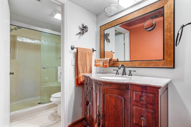 5200 E Club Cir Unit 106, Boca Raton, FL 33487 - full bathroom featuring toilet, a shower stall, vanity, and a textured ceiling