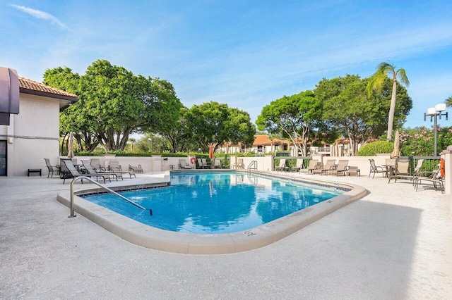 5200 E Club Cir Unit 106, Boca Raton, FL 33487 - community pool featuring a patio