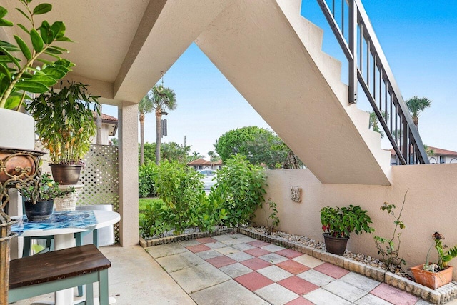 5200 E Club Cir Unit 106, Boca Raton, FL 33487 - view of patio / terrace featuring stairway