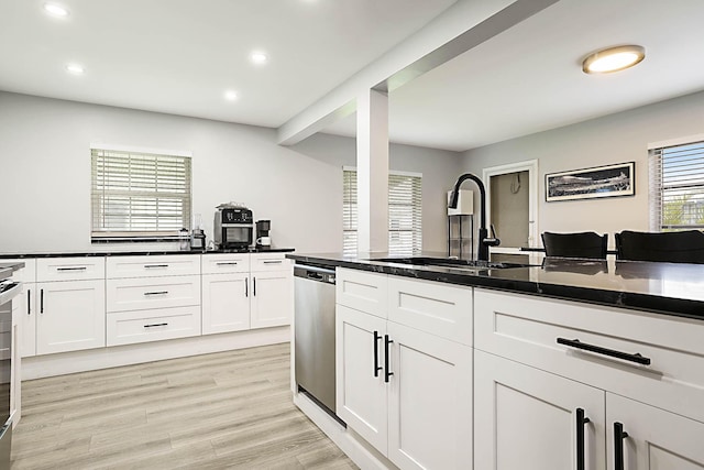 2388 SW Congress Blvd, Boynton Beach, FL 33426 - kitchen featuring dishwasher, recessed lighting, a sink, white cabinets, and dark countertops