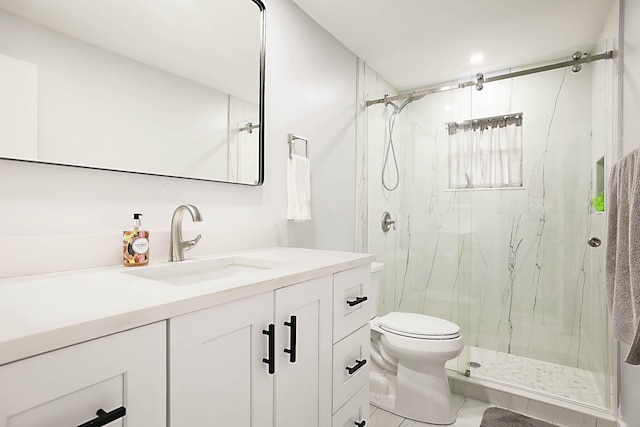 2388 SW Congress Blvd, Boynton Beach, FL 33426 - bathroom with a marble finish shower, toilet, and vanity