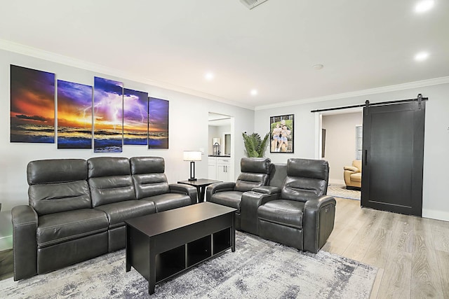 2388 SW Congress Blvd, Boynton Beach, FL 33426 - home theater room with a barn door, light wood finished floors, ornamental molding, recessed lighting, and baseboards